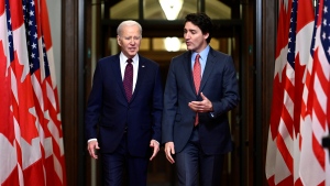 Prime Minister Justin Trudeau and U.S. President Joe Biden arrive to an official welcome ceremony on Parliament Hill, in Ottawa, Friday, March 24, 2023. (Justin Tang/THE CANADIAN PRESS) 