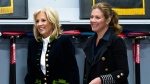 First lady Jill Biden, and Sophie Gregoire Trudeau speak with youth at the Rideau Curling Club in Ottawa, March 24, 2023. THE CANADIAN PRESS/Spencer Colby