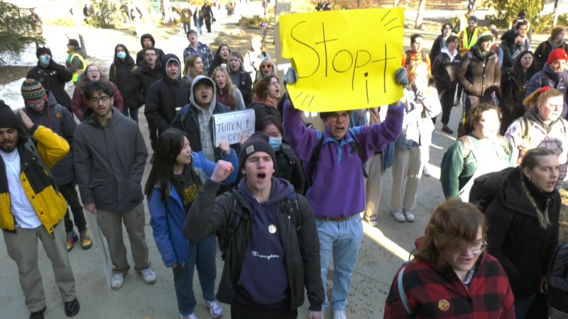 Students protest tuition increases at a University of Alberta board of governors meeting on March 24, 2023.