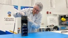 A CubeSat designed by the University of Manitoba, named Iris, will be transported to the International Space Station in June. (Image source: Jon Hendricks/CTV News Winnipeg)