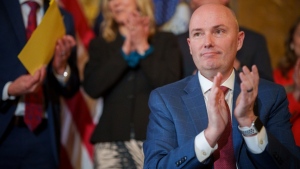 Gov. Spencer Cox applauds after signing two social media regulation bills during a ceremony at the Capitol building in Salt Lake City on Thursday, March 23, 2023. (Trent Nelson/The Salt Lake Tribune via AP)