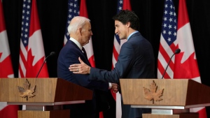 U.S. President Joe Biden and Prime Minister Justin Trudeau embrace following a joint press conference, in Ottawa, Friday, March 24, 2023. THE CANADIAN PRESS/Sean Kilpatrick