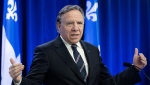 Quebec Premier Francois Legault speaks during a news conference in Montreal, Friday, March 24, 2023, where he gave his reaction to the imminent closure of the Roxham road irregular border crossing. THE CANADIAN PRESS/Graham Hughes