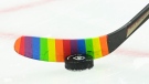 An Ottawa Senators player warms-up with rainbow coloured hockey tape as part of a #HockeyIsForEveryone campaign prior to taking on the Vancouver Canucks in NHL hockey action in Ottawa on Wednesday, April 28, 2021. THE CANADIAN PRESS/Sean Kilpatrick
