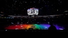 The ice is lit in rainbow light for Pride Night before an NHL hockey game between the Anaheim Ducks and the Los Angeles Kings, Monday, April 26, 2021, in Los Angeles. (AP Photo/Ashley Landis, File)