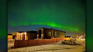 Northern lights over West St. Paul. Photo by Alfredo Velasco.