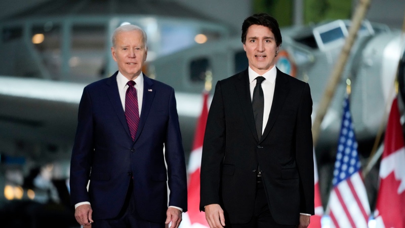 President Joe Biden and Canadian Prime Minister Justin Trudeau arrive for a Gala Dinner at the Canadian Aviation and Space Museum, Friday, March 24, 2023, in Ottawa, Canada. (AP Photo/Andrew Harnik)