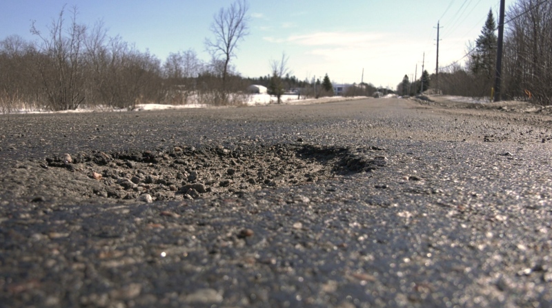 A photo of a pothole in Northern Bay on Mach 24/23. (Eric Taschner/CTV News Northern Ontario)