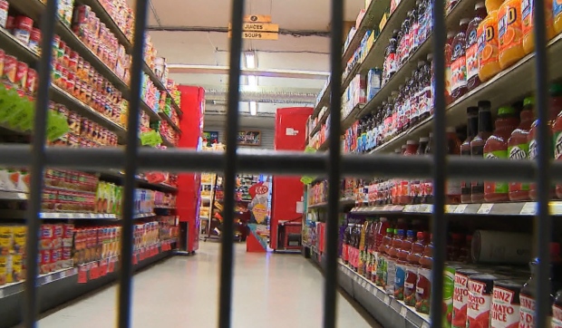 Grocery store aisle as viewed from inside a shopping cart. (File photo)