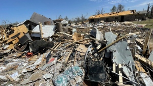 Debris covers the ground on Saturday, March 25, 2023 in Silver City, Miss. Emergency officials in Mississippi say several people have been killed by tornadoes that tore through the state on Friday night, destroying buildings and knocking out power as severe weather produced hail the size of golf balls moved through several southern states. (AP Photo/Michael Goldberg)
