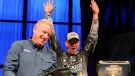 Canadian Jeff Gustafson, right, reacts after his five fish had weighed 18 pounds, eight ounces to give him the overall lead the opening day of the US$1-million Bassmaster Classic in Knoxville, Tenn. THE CANADIAN PRESS/Bass Anglers Sportsman Society