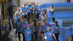 The members of Edmonton's "Breast Friends" dragon boat racing team meet for a practice on March 26 in advance of the 2023 international competition in New Zealand. 