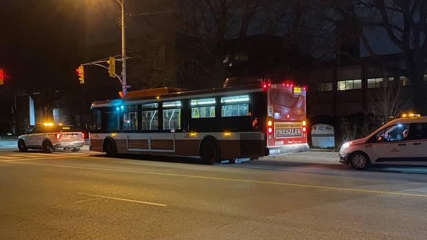 Officers attend the scene of a stabbing on a TTC bus on March 26, 2023. (Michael Nguyen)