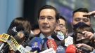 Former Taiwan President Ma Ying-jeou before leaving for China at Taoyuan International Airport in Taiwan, on March 27, 2023. (Chiang Ying-ying / AP)