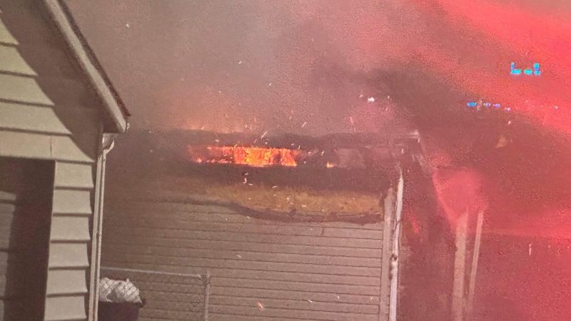A garage fire in the 1300 block of Langlois Street in Windsor on March 26, 2023. (Source: @_OnLocation_/Twitter)