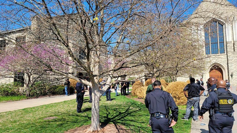 This photo provided by the Metro Nashville Police Department shows officers at an active shooter event that took place at Covenant School, Covenant Presbyterian Church, in Nashville, Tenn., March 27, 2023. Authorities say the suspect in a shooting at a private Christian school in Nashville is dead. (Metro Nashville Police Department via AP)