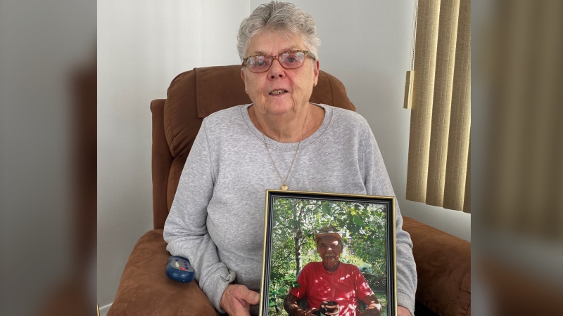 Sharron MacDonald holds a photo of her 72-year-old brother Brian Lewis, who disappeared on March 18. (Alana Pickrell/CTV Atlantic)