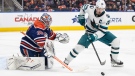 San Jose Sharks' Logan Couture (39) is stopped by Edmonton Oilers goalie Jack Campbell (36) during third period NHL action in Edmonton on Monday March 20, 2023.THE CANADIAN PRESS/Jason Franson