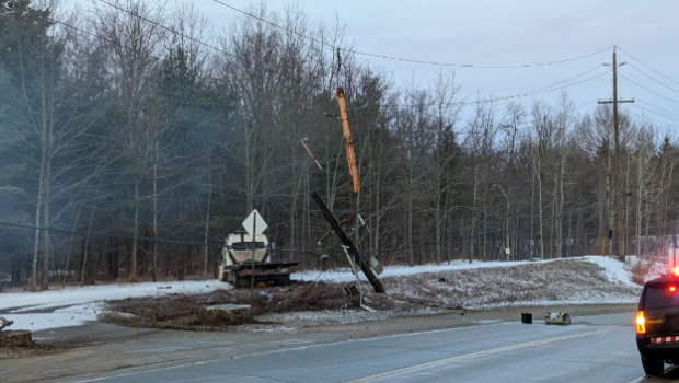 A hyro pole and lines can be seen damaged along Wellington Road 18 near Elora. (Twitter/OPP West Region)