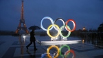 A display of the Olympic rings is set up on Trocadero plaza that overlooks the Eiffel Tower, after the vote in Lima, Peru, awarding the 2024 Games to the French capital, in Paris, France, Wednesday, Sept. 13, 2017. (AP Photo/Francois Mori, File)