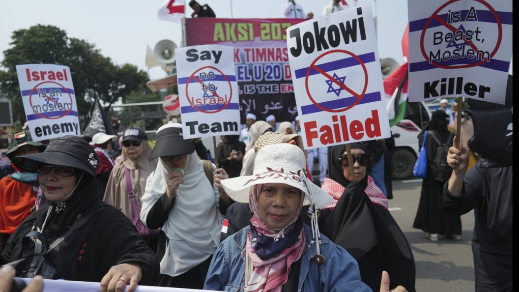 Protesters march during a protest in Jakarta