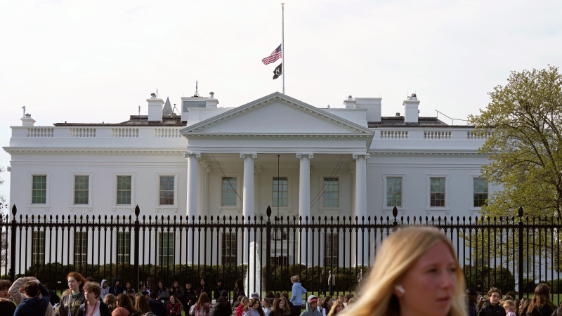 The flag flies at half-staff at White House in Washington, Tuesday, March 28, 2023, after a shooting at a private Christian grade school in Nashville. (AP Photo/Susan Walsh)