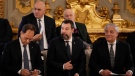 In this file photo, from left, Italy's new government Minister of relations with the parliament Luca Ciriani, Infrastructure, sustainable mobility and Vice premier Matteo Salvini, Foreign minister and Vice premier Antonio Tajani, Defense Minister Guido Crosetto, top left, and Justice Minister Carlo Nordio attend the swearing in ceremony of Italy's first far-right-led government since the end of World War II at Quirinal presidential palace in Rome, Saturday, Oct. 22, 2022. (AP Photo/Alessandra Tarantino)