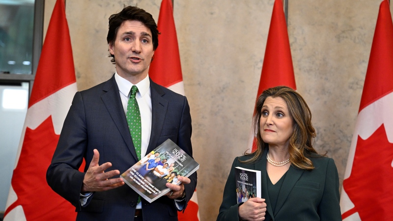 Prime Minister Justin Trudeau and Deputy Prime Minister and Minister of Finance Chrystia Freeland speak to media as they arrive to deliver the federal budget in the House of Commons on Parliament Hill in Ottawa, Tuesday, March 28, 2023. THE CANADIAN PRESS/Justin Tang 