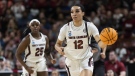 South Carolina's Brea Beal (12) brings the ball upcourt against Maryland in the second half of an Elite 8 college basketball game of the NCAA Tournament in Greenville, S.C., Monday, March 27, 2023. (AP Photo/Mic Smith)