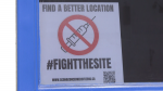 A sign protesting the location of a proposed "health hub" on 81 Avenue and 101 Street in Edmonton. (John Hanson/CTV News Edmonton) 