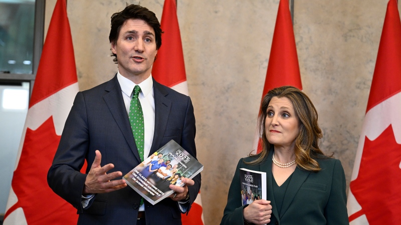 Prime Minister Justin Trudeau and Deputy Prime Minister and Minister of Finance Chrystia Freeland speak to media as they arrive to deliver the federal budget in the House of Commons on Parliament Hill in Ottawa, Tuesday, March 28, 2023. THE CANADIAN PRESS/Justin Tang 