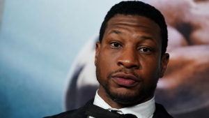 Jonathan Majors arrives at the premiere of "Creed III" on Feb. 27, 2023, at TCL Chinese Theatre in Los Angeles. (Photo by Jordan Strauss/Invision/AP, File)