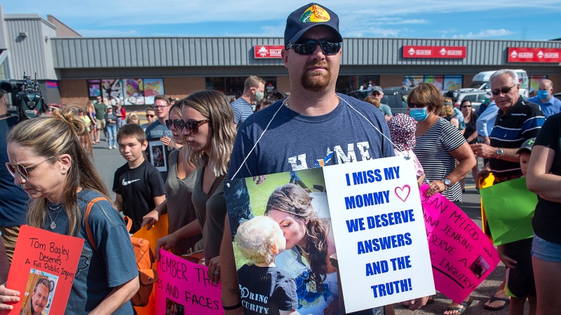 Nick Beaton, whose wife Kristen Beaton was killed in the April mass shooting, attends a march organized by families of victims demanding an inquiry into the crimes in Nova Scotia that killed 22 people, in Bible Hill, N.S. on Wednesday, July 22, 2020.THE CANADIAN PRESS/Andrew Vaughan
