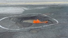 A pothole is seen on a Halifax street on March 28, 2023. (Bruce Frisko/CTV Atlantic)