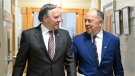 Quebec Premier Francois Legault, left, walks to a cabinet meeting with Quebec Health Minister Christian Dube who tabled a major legislation on health, at the legislature in Quebec City, Wednesday, March 29, 2023. THE CANADIAN PRESS/Jacques Boissinot