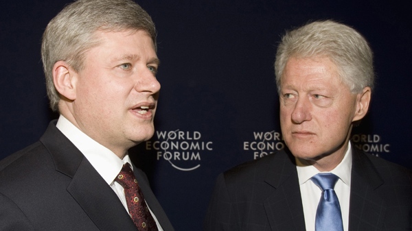 Prime Minister Stephen Harper answers questions as he meets with former U.S. president Bill Clinton at the World Economic Forum in Davos, Switzerland, Thursday, Jan. 28, 2010. (Frank Gunn  / THE CANADIAN PRESS) 