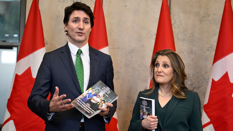 Prime Minister Justin Trudeau and Deputy Prime Minister and Minister of Finance Chrystia Freeland speak to media as they arrive to deliver the federal budget in the House of Commons on Parliament Hill in Ottawa, Tuesday, March 28, 2023. THE CANADIAN PRESS/Justin Tang