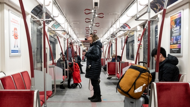 Passengers ride the subway in Toronto on Friday, January 27, 2023. THE CANADIAN PRESS/Chris Young