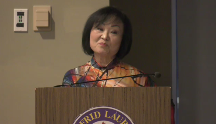 Kim Phuc Phan Thi delivering the keynote speech at Wilfrid Laurier University on March. 29. (CTV Kitchener)
