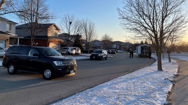 Waterloo Regional Police are seen in the area of Erinbrook Drive and Rockwood Road in Kitchener on Thursday. (Karis Mapp/CTV Kitchener)