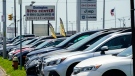 Used cars for sale are parked roadside at an auto lot in Philadelphia, Tuesday, July 12, 2022. After a brief break, used car prices are on the rise again. (AP Photo/Matt Rourke)