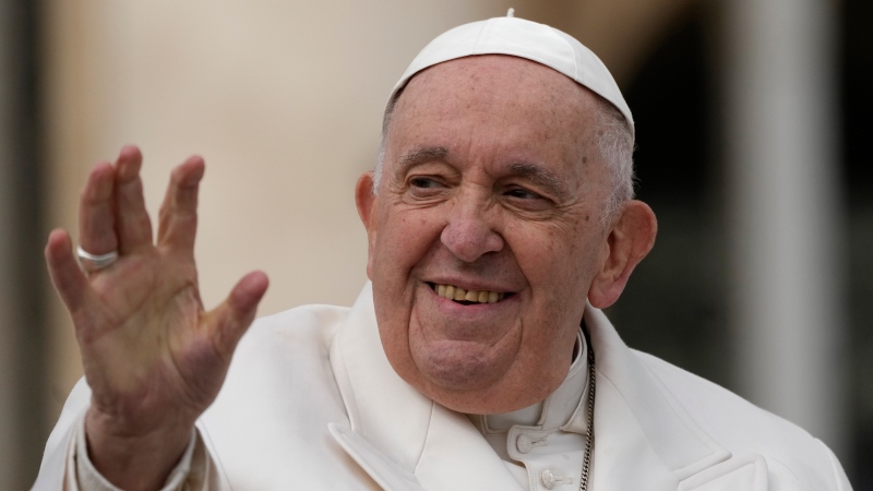 Pope Francis waves to faithful during his weekly general audience in St. Peter's Square, at the Vatican, Wednesday, March 29, 2023. (AP Photo/Alessandra Tarantino)