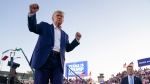 Former U.S. president Donald Trump dances during a campaign rally after speaking at Waco Regional Airport, March 25, 2023, in Waco, Texas. (AP Photo/Evan Vucci, File)