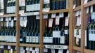 Bottles of wine are seen in a wine shop in central London, Monday, March 16, 2009. (AP Photo/Sang Tan)
