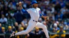 Chicago Cubs starting pitcher Marcus Stroman throws during the first inning of a baseball game against the Milwaukee Brewers, on March 30, 2023. (Erin Hooley / AP)