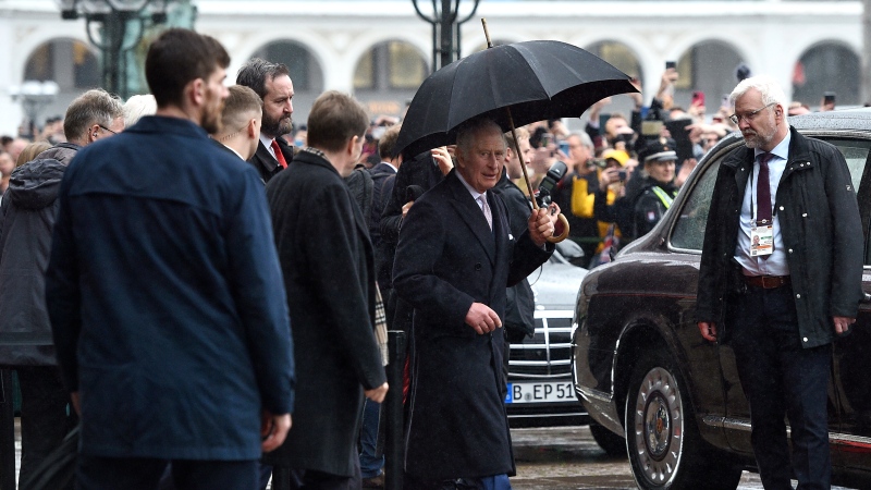 King Charles III leaves the city hall in Hamburg, Germany, Friday, March 31, 2023.  (AP Photo/Gregor Fischer)