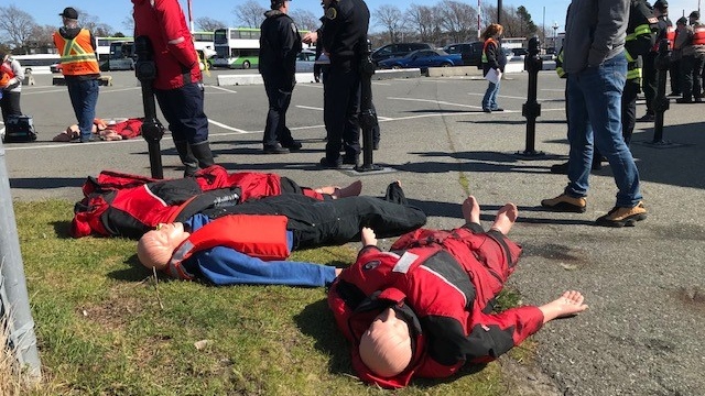 Several coast guard cadets played the injured victims onboard the burning boat, along with life-sized dummies floating in the water. (CTV News)