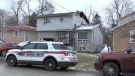 York Regional Police and an investigator with the Ontario Fire Marshal's office are investigating a house fire in Keswick, Ont., on Fri., March 31, 2023. (CTV News/Steve Mansbridge)