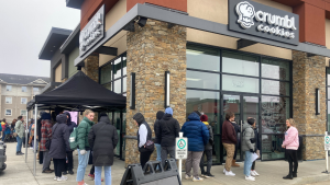 Customers lineup outside Crumbl Cookie in Edmonton on opening day. (Dave Mitchell/CTV News Edmonton)