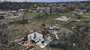 Debris is strewn about tornado damaged homes, Sunday, March 26, 2023, in Rolling Fork, Miss. Meteorologists are urging people in parts of the Midwest and southern U.S. to be ready Friday, March 31, for dangerous weather including tornadoes, saying the conditions are similar to those a week ago that unleashed a devastating twister that killed at least 21 people in Mississippi. (AP Photo/Julio Cortez,File)